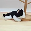 Gato blanco y negro de 18 cm, con tres posturas y aroma.
