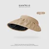 Black vinyl seashell - khaki