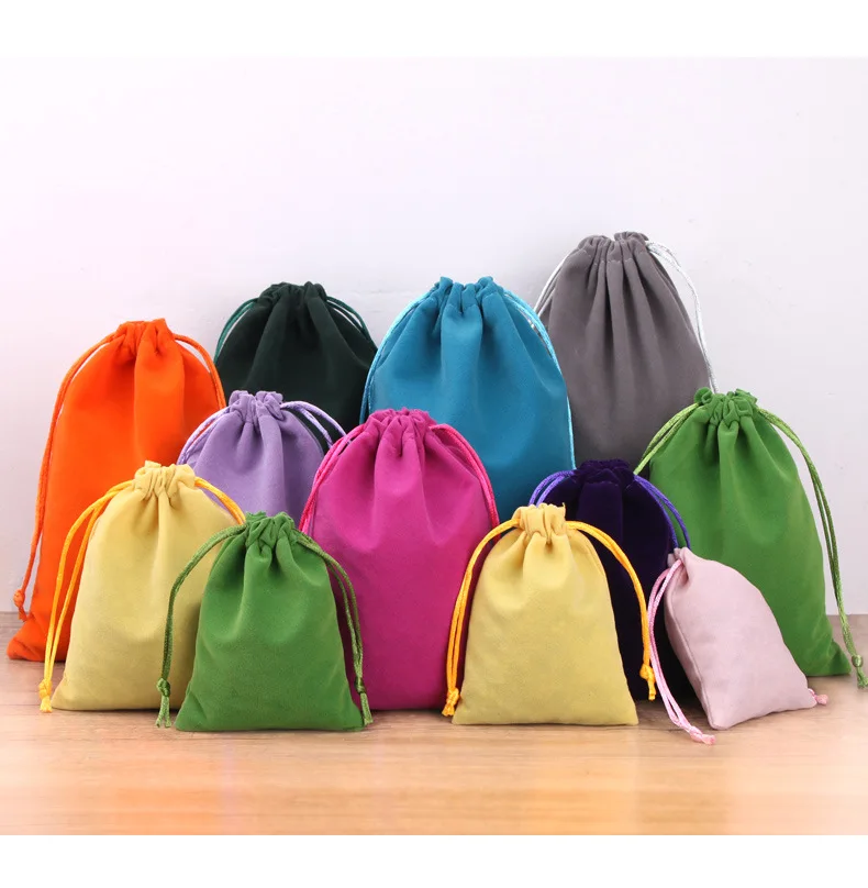 Branding Method Showcase Various logo customization techniques on velvet pouches