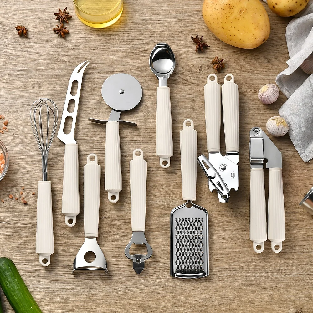 9-Piece Stainless Steel Kitchen Gadget Set Whisk Can Opener Pizza Cutter Garlic Press Tools