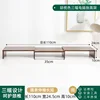 Walnut-colored three-monitor riser stand