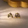 Orecchini ad artiglio di drago - bronzo anticato
