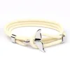 A silver fish tail with a beige rope 10