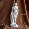 Goddess with head bowed