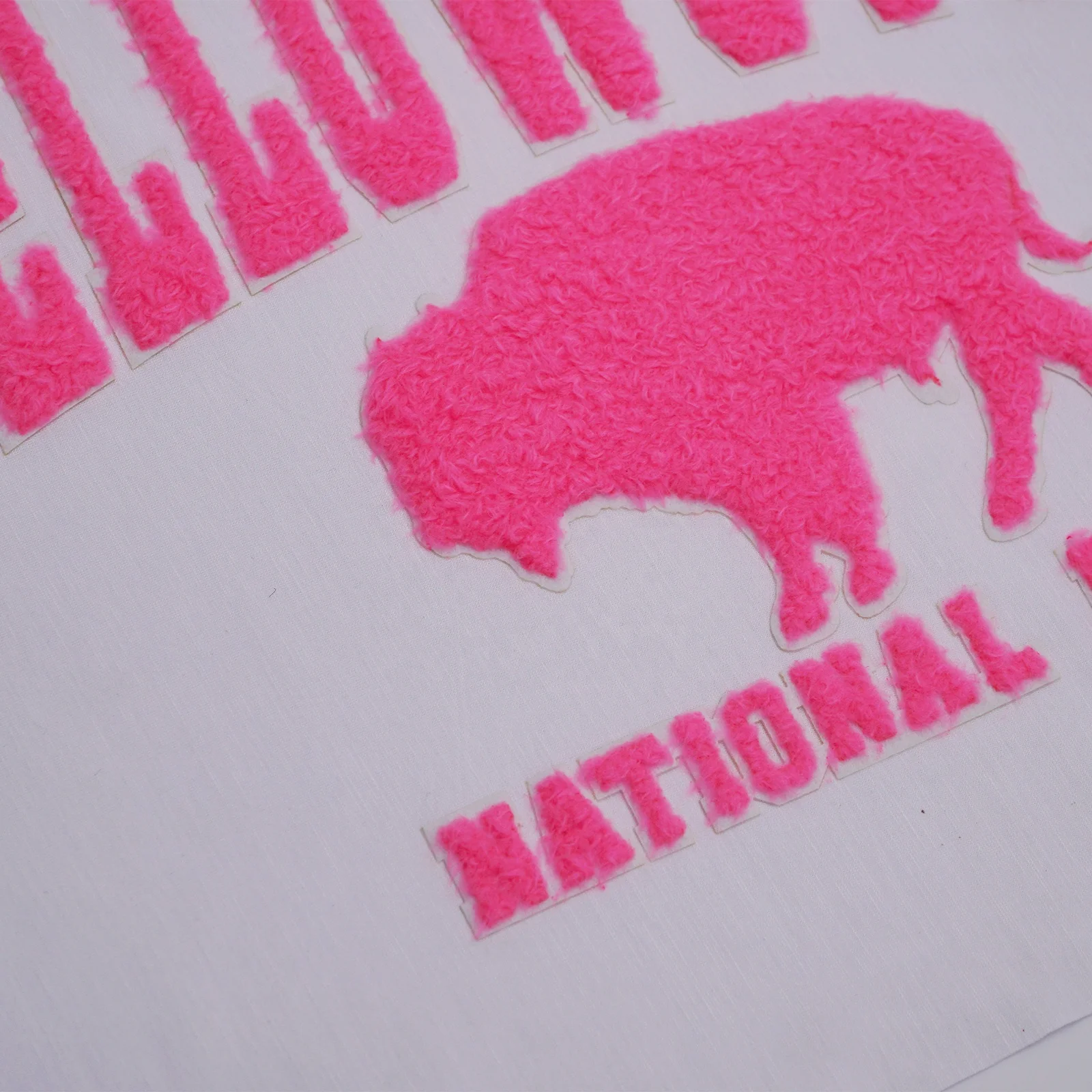 How to apply custom embroidered iron on patches for a professional finish