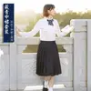 Tailleur jupe midi bleu marine manches longues femme