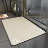 Alfombra de baño de tierra de diatomeas de nueva generación - cabeza de gato beige