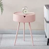 Three-legged bedside table pink