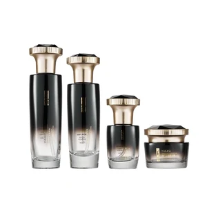 High Quality Wholesale Custom 100ml 120ml Black Gradient Glass Pump Bottle 40ml 50g Jar Personalized Diamond Cap Set Face Cream