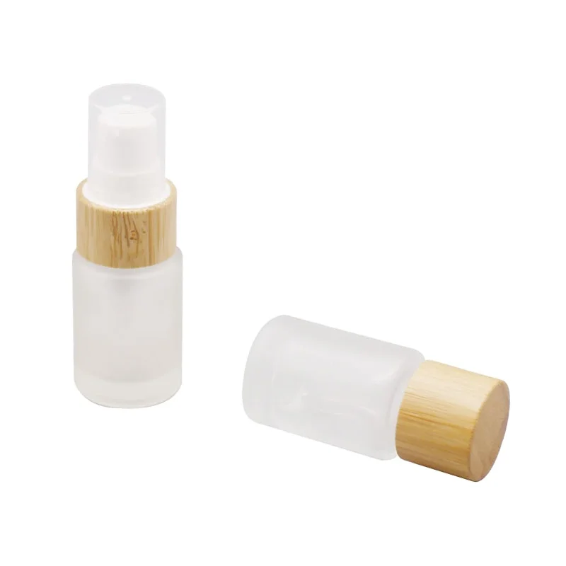 Eco Friendly 20ml Empty Round Liquid Packaging Container Frosted Glass Packaging Spray Bottle With Bamboo Pump Sprayer