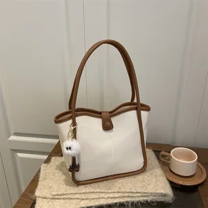 Lightweight Luxury Handbag for Women PU Leather Bucket Bag with Pendant Autumn and Winter New Crossbody Bag