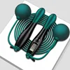 Black and blue handle rope ball