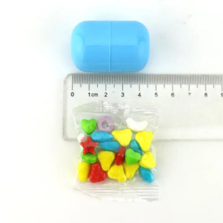 Capsule candy dispenser