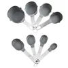 Juego de 8 piezas de cucharas y tazas