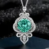 White Gold Parra green pendant with Chopin chain