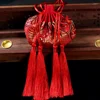 Rosso pavone con doppia nappa