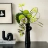 Boules de pin elfe vert-bouteille de fleurs noires
