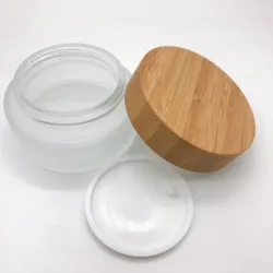 Customized Thick Bottom Small 5G 20G 30G 50G 100 Ml 200Ml Cosmetic Wooden Wood Bamboo Lids Cap Cosmetic Frosted Clear Glass Jars