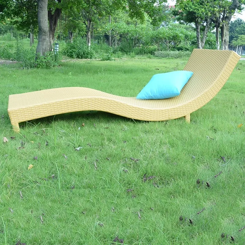 green plastic garden loungers