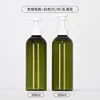 Bright green bottle with white lotion pump
