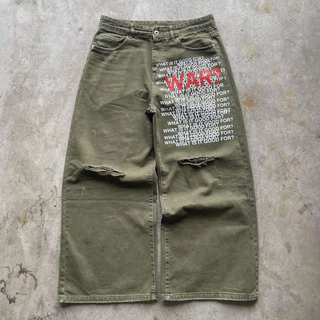 Jeansy vintage z efektem zużycia, wysokie w talii, z zatrzaskami, z przetartym wykończeniem, z nadrukiem sitodrukowym na denimie, rozszerzające się ku dołowi.