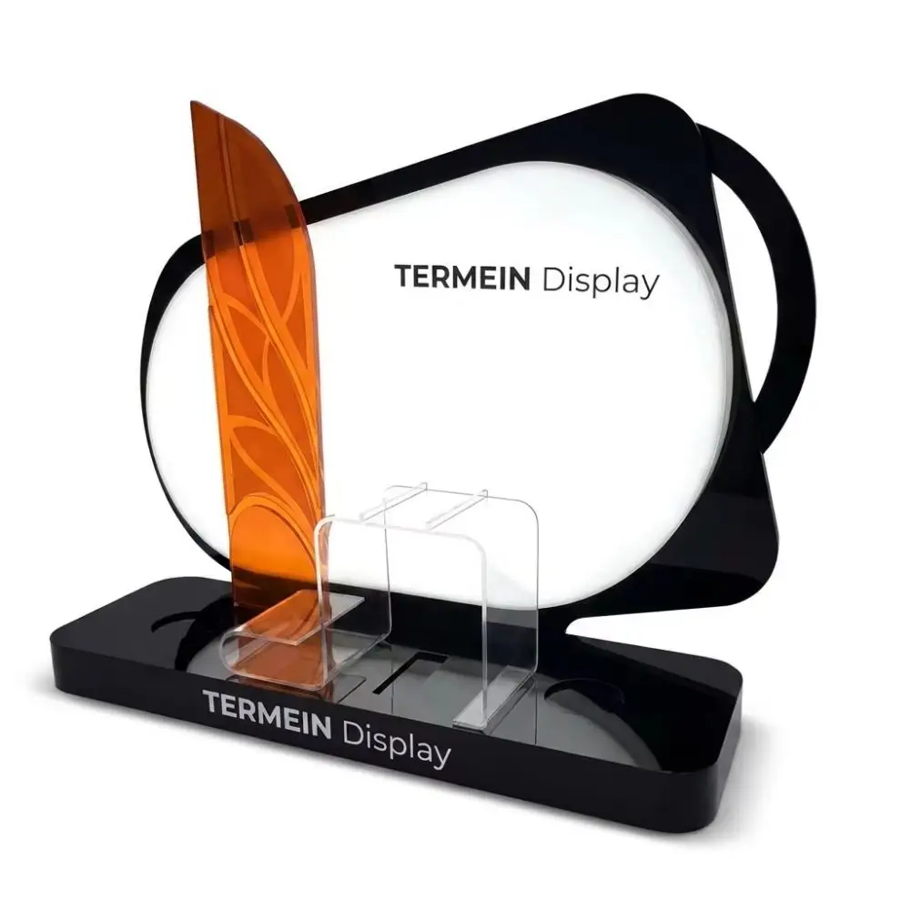 Custom curved black frame acrylic cosmetic display stand with orange leaf accent panel for skincare brand showcase TERMEIN Display