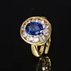 Gold blue pointed crystal ring