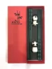 Palillos verdes panda con caja roja
