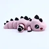 Estegosaurio pequeño rosa de 10 cm