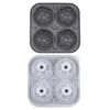 4 gray football-shaped ice molds