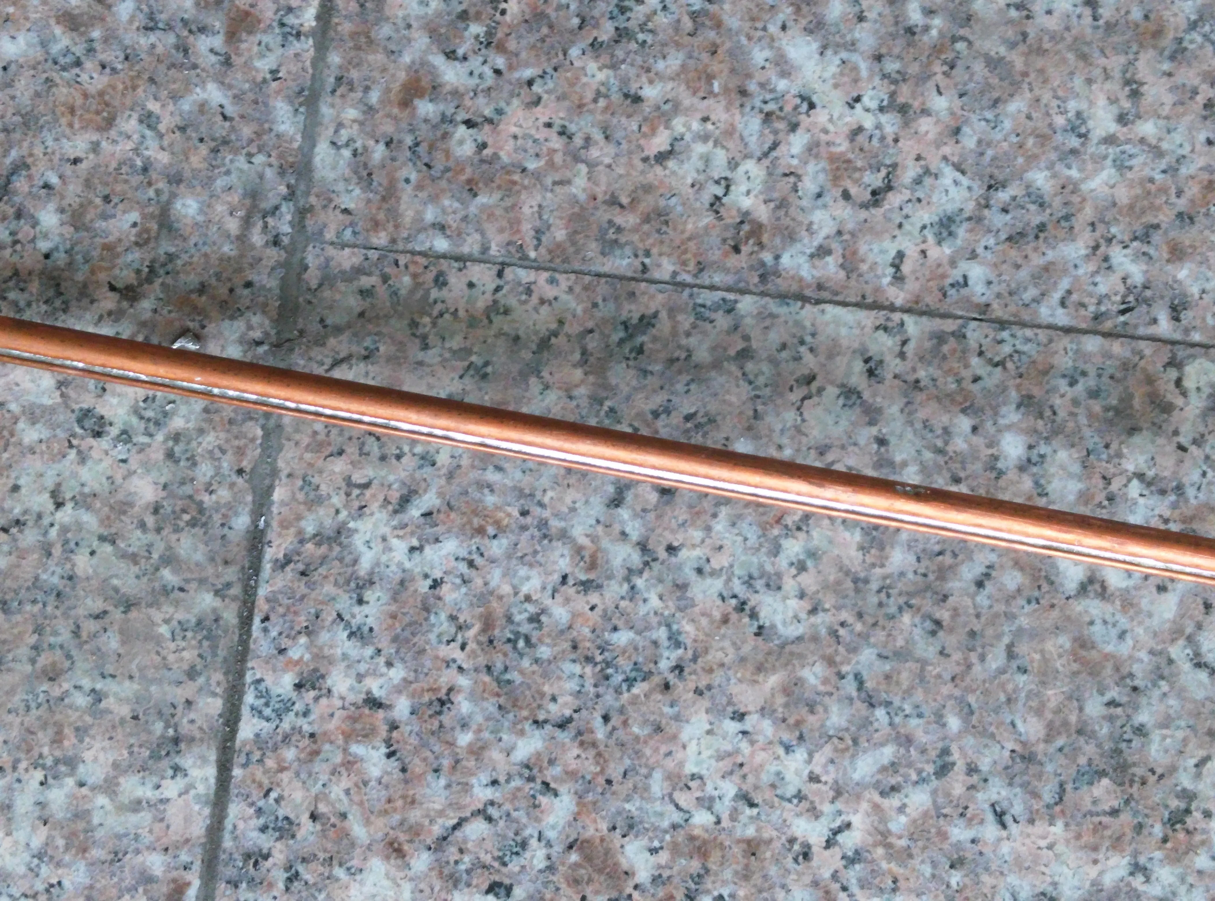 BOBO Machine high frequency connecting capillary tube to copper tube shown in a detail photo for this news article