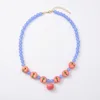 collana di mele rosa