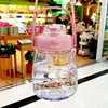 Pink cup with straw and stickers
