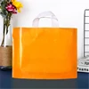 Orange with white handle