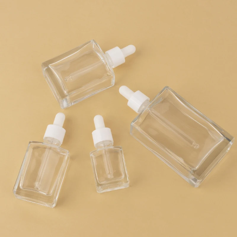 Luxury custom square cosmetic clear 15ml 30ml 50ml 100ml face hair glass serum essential oil dropper bottle details