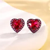 Black Gold red corundum stud earrings