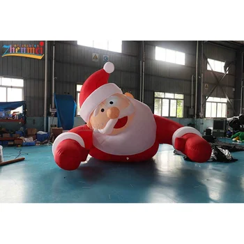 Zhenmei Manufacturer Good Quality Giant xmas Inflatable Santa Claus lying Ground Balloon for Events