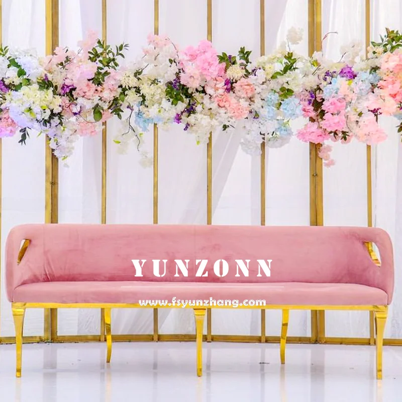 Velvet upholstered bridal couch with gold stainless steel base - detail shot