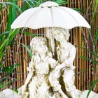 Fountain With Boys And Girls Holding Umbrellas Garden Buildings