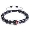 Red Tiger eyes stone + Black gallstone