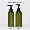 Matte green bottle with black lotion pump