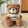Orsetto di peluche marrone - maglione bianco