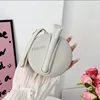 Bolsa redonda gris para labiales - Bolsa de almacenamiento universal