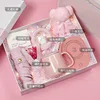 Posavasos para tazas, paraguas, luz nocturna, toalla, ramo de flores, tarjeta de felicitación, regalo.