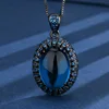 Black gold Blue pointed crystal pendant with box chain