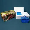 Cajas de espuma para cestas de frutas coloridas.