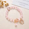 Bracciale margherita con perline di popcorn rosa