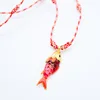 Big red fish necklace
