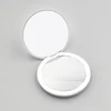 White  round mirror