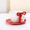 Red bow cup and saucer set